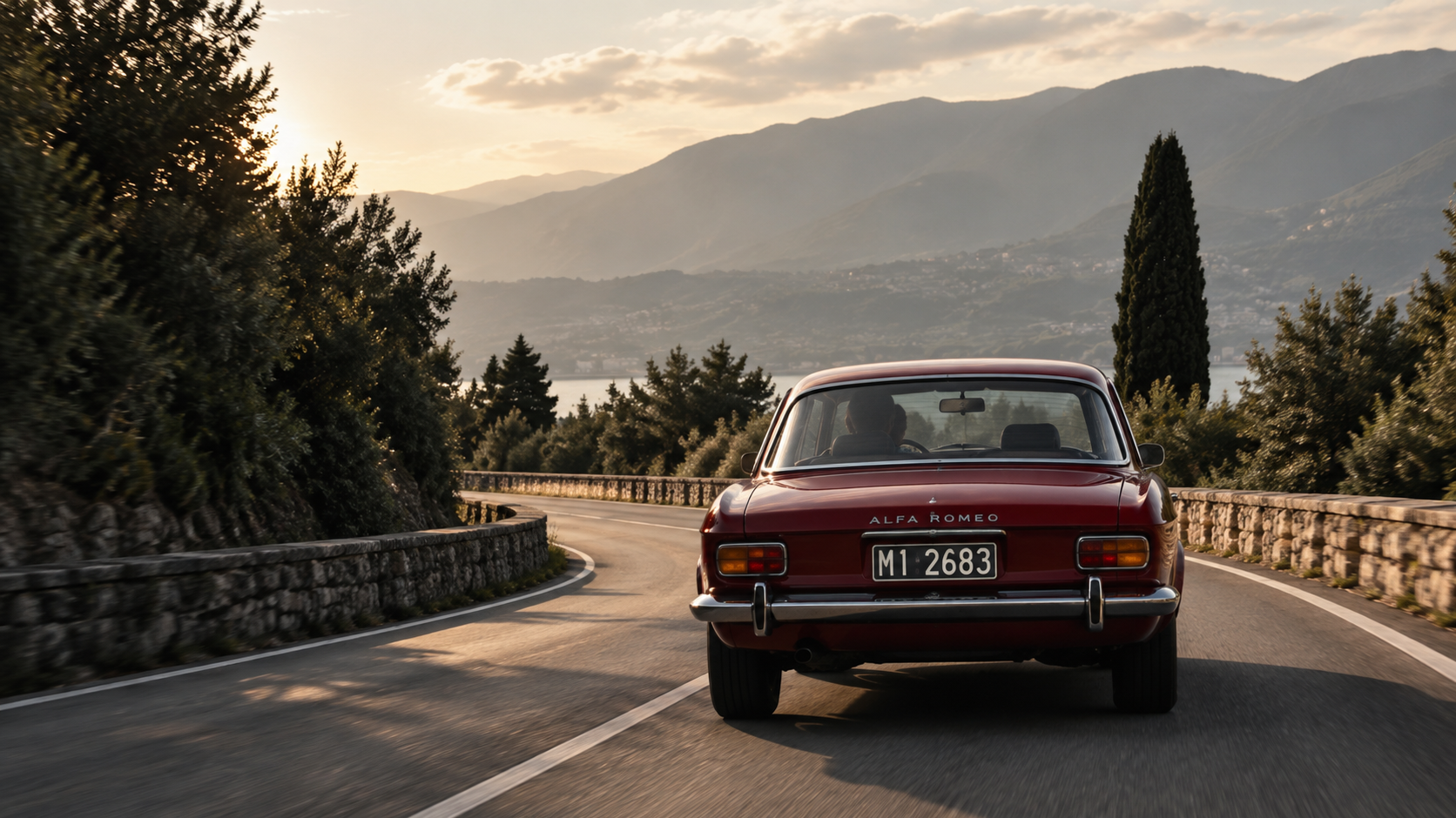 Alfa Romeo clásico rojo en un paisaje italiano